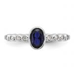 SS Rh-plated .01Created White Sapphire .56Created Blue Spinel Ring