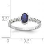 SS Rh-plated .01Created White Sapphire .56Created Blue Spinel Ring