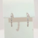 Platinum .04 CTW Natural Diamond Hoop Earrings - 86690