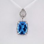 14K White Natural Swiss Blue Topaz & .025 CTW Natural Diamond Pendant - 651603